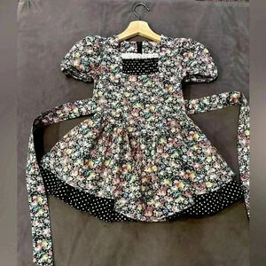 Floral and black polka dot girls layered dress. 4T puff sleeve tie back. Spring